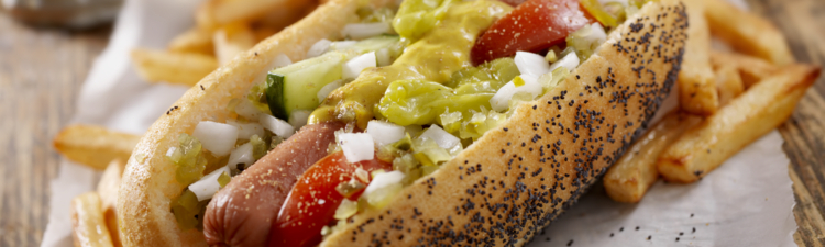 A Classic Chicago Dog with Fries and a Beer - The Chicago Dog has a Steamed Poppyseed Bun, Fresh Tomatoes, Diced Onions, Neon Green Relish,Peppers,Pickle, Yellow Mustard and a Dash of Celery Salt- Photographed on Hasselblad H3D2-39mb Camera