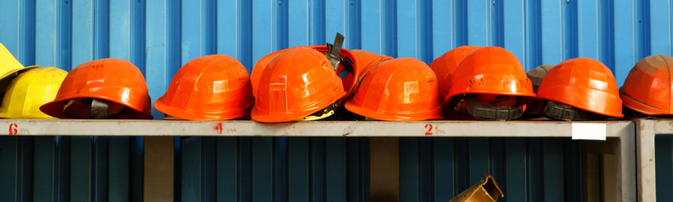 Work safety helmets in industrial site.