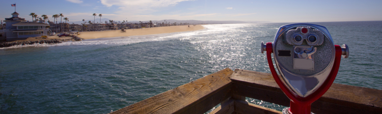 Newport beach in California view from pier binocular telescope