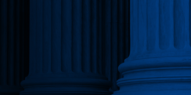 Dark blue image of columns