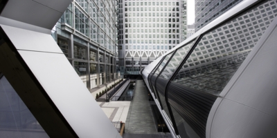 View from the new Crossrail station in Canary Wharf looking towards One Canada Square. The walkway to the right is the Adams Plaza Bridge. Very futuristic view of modern London.